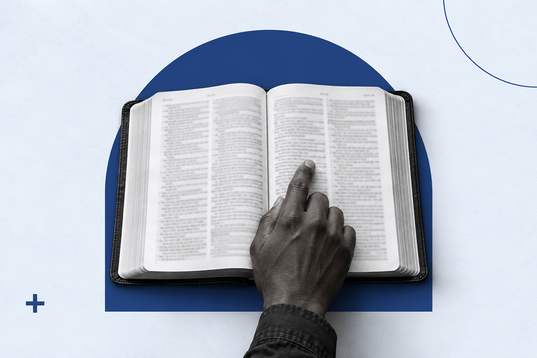 AI Bible study: a hand pointing to a verse in an open Bible